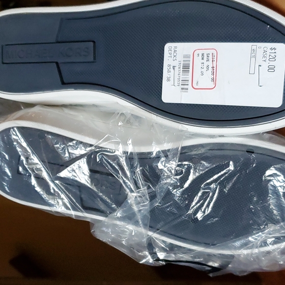 mk sneakers. color  white with logo across  in red n blue. - Picture 4 of 4